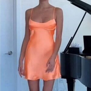 Zara orange dress silk material. Size xs. Worn once!